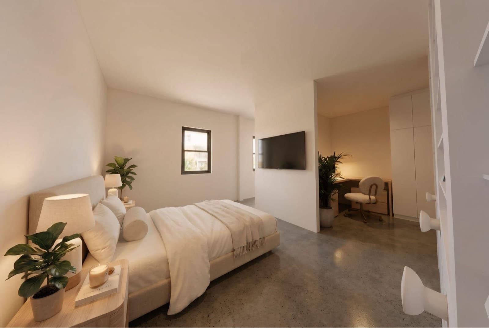 Furnished co-living bedroom with dedicated workspace